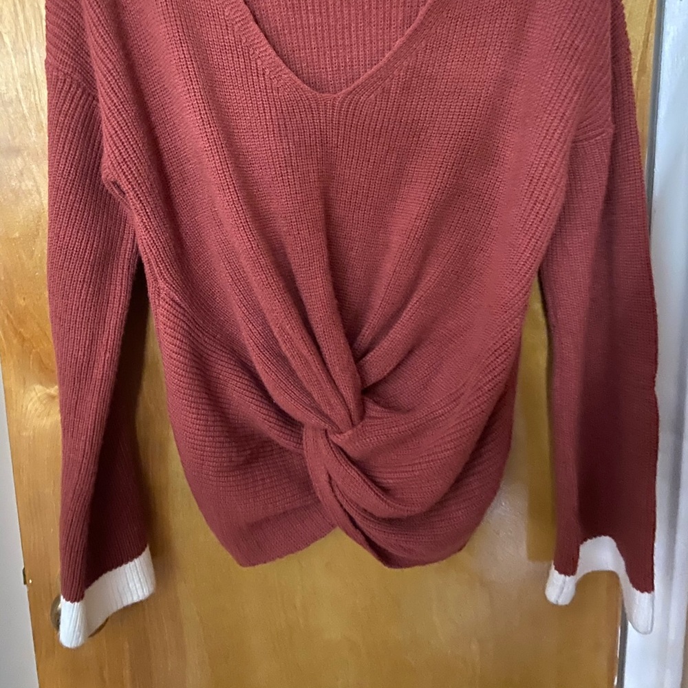 Sweater with knitted front